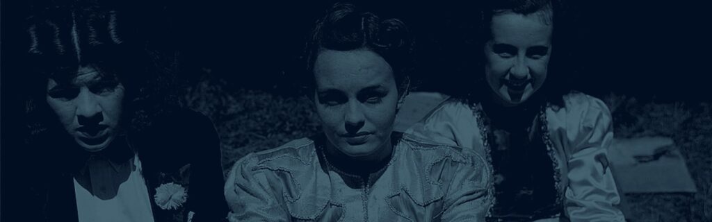 Dark image of women as a vintage circus