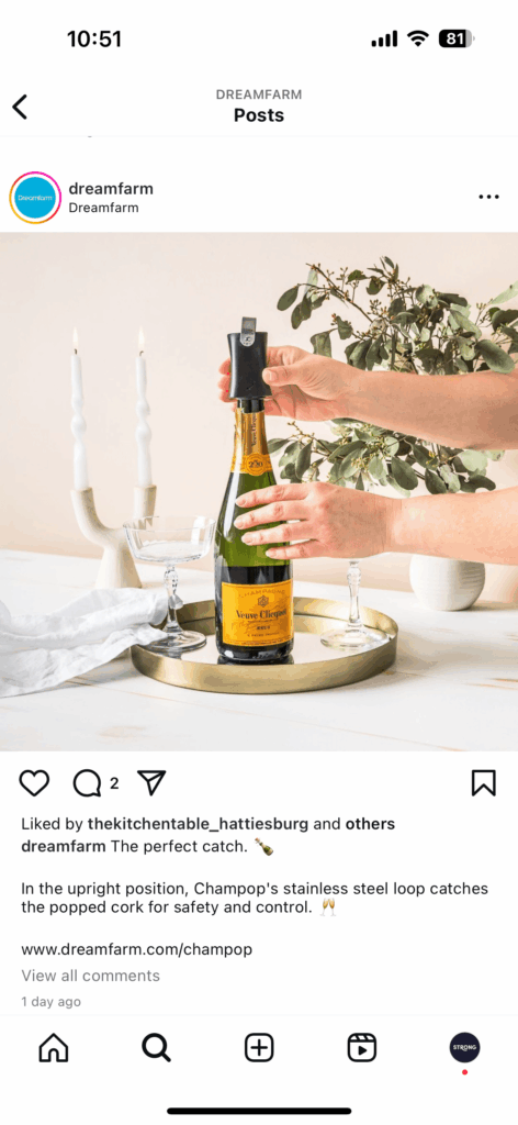 Put Your Customers First: How to Build a Winning Digital Strategy 3 Amidst flickering candles and lush plants, a person expertly opens a champagne bottle with a special tool on a tray, as if executing a well-choreographed digital strategy.